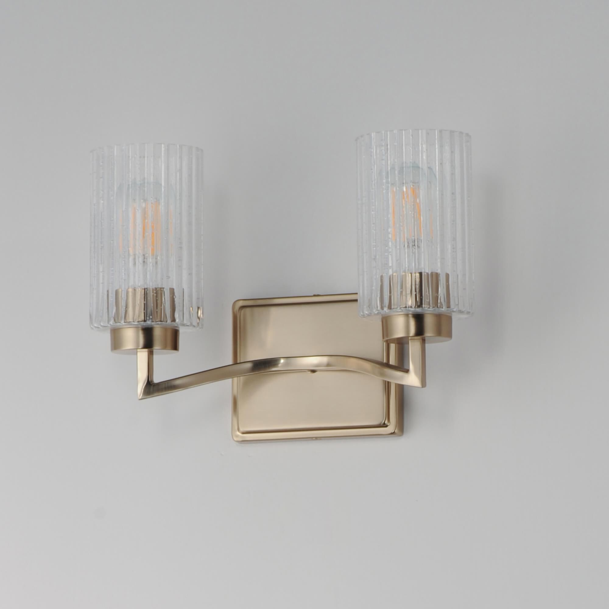 Shown in Satin Champagne finish and Clear Ribbed glass and Glass shade