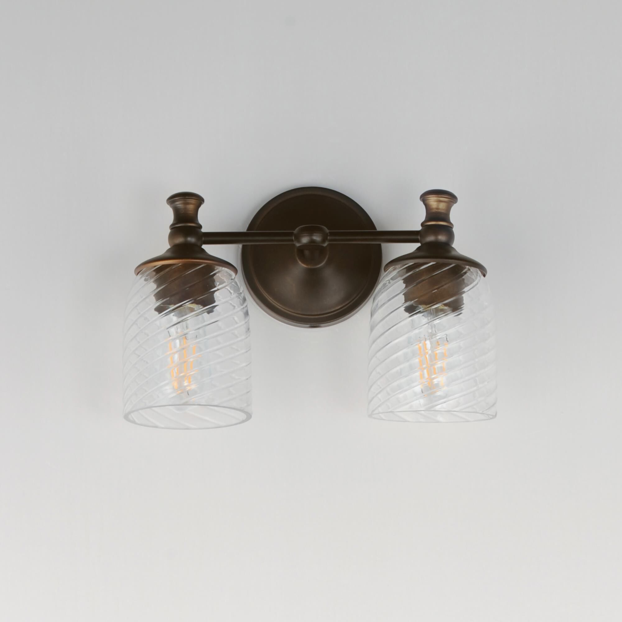 Shown in Antique Bronze finish and Clear Ribbed glass and Glass shade