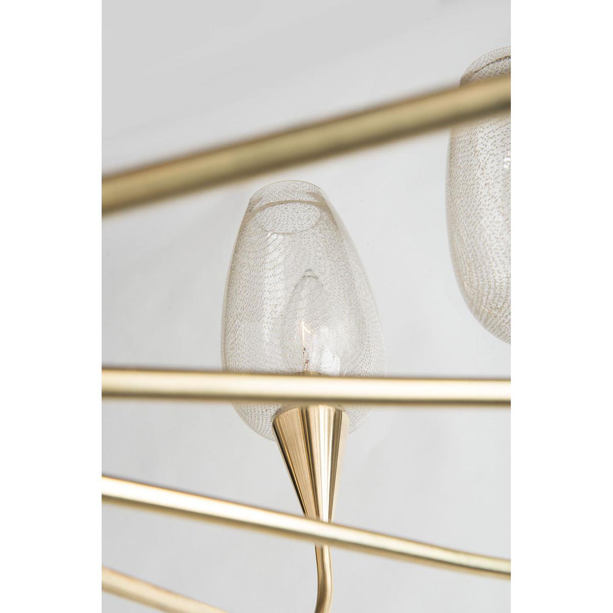 Shown in Aged Brass finish and Clear Gold Mesh glass