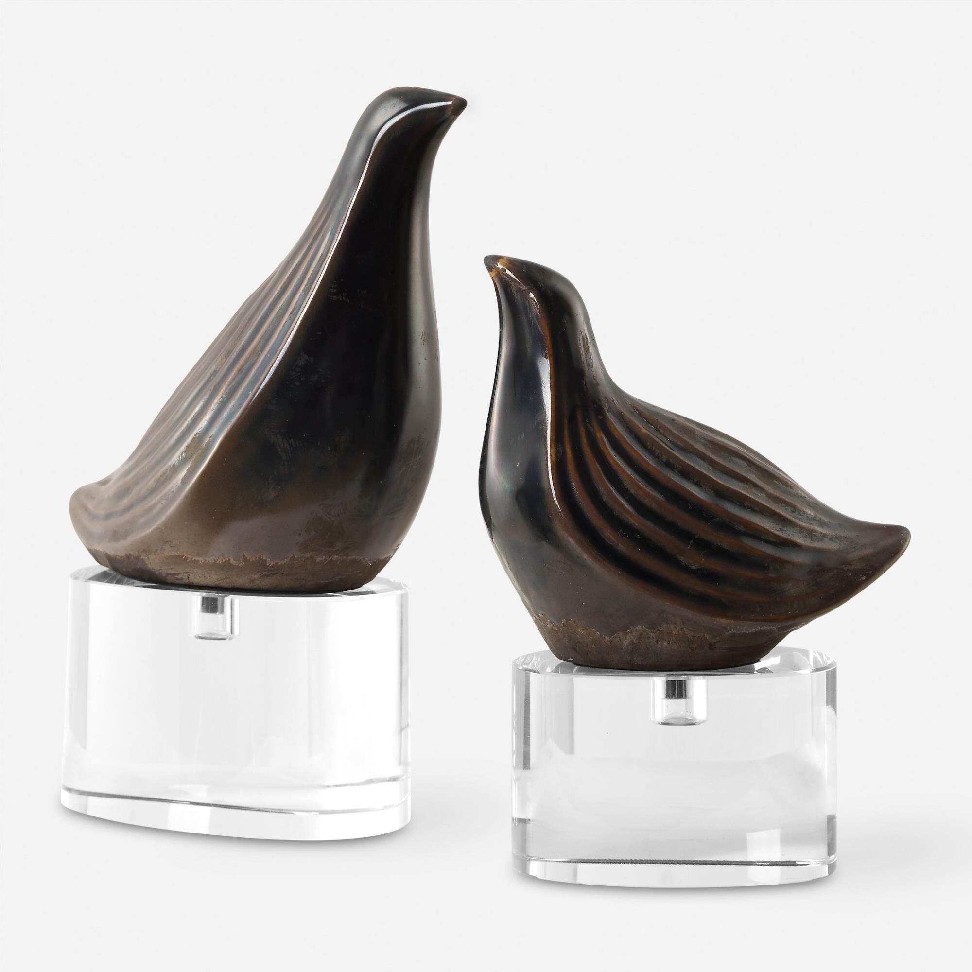 Shown in Bring A Touch Of Nature Indoors With Our Set Of Two Nesting Bird Sculptures. The Gunmetal Gray Finis finish