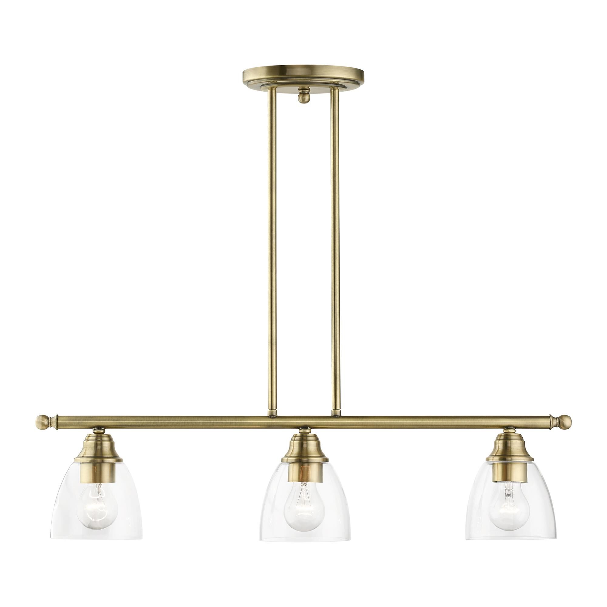 Shown in Antique Brass finish and Hand Blown Clear glass