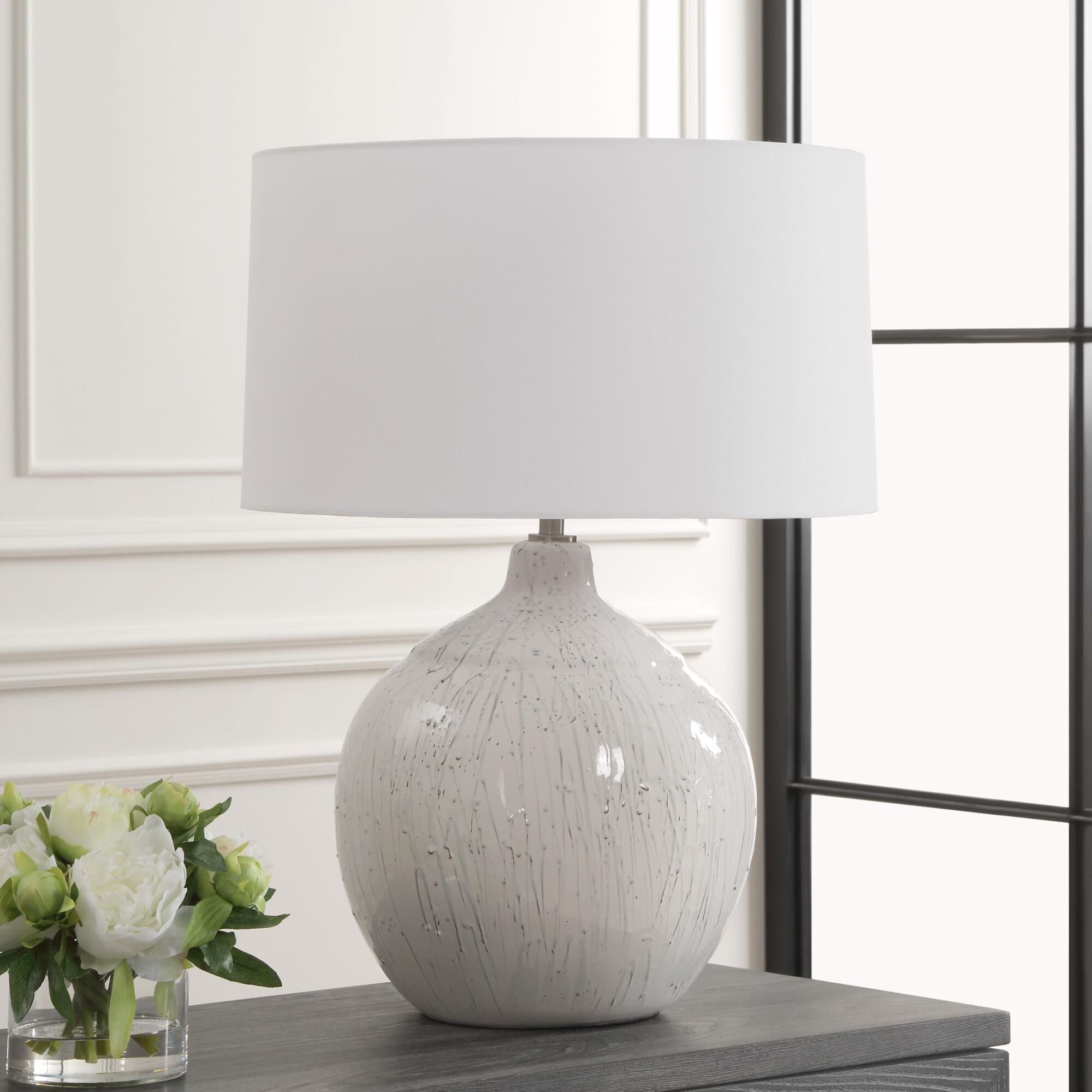 Shown in This Ceramic Table Lamp Features A White Glaze Finish With A Dripped Gray Texture, Paired With Plate finish and Round Hardback shade