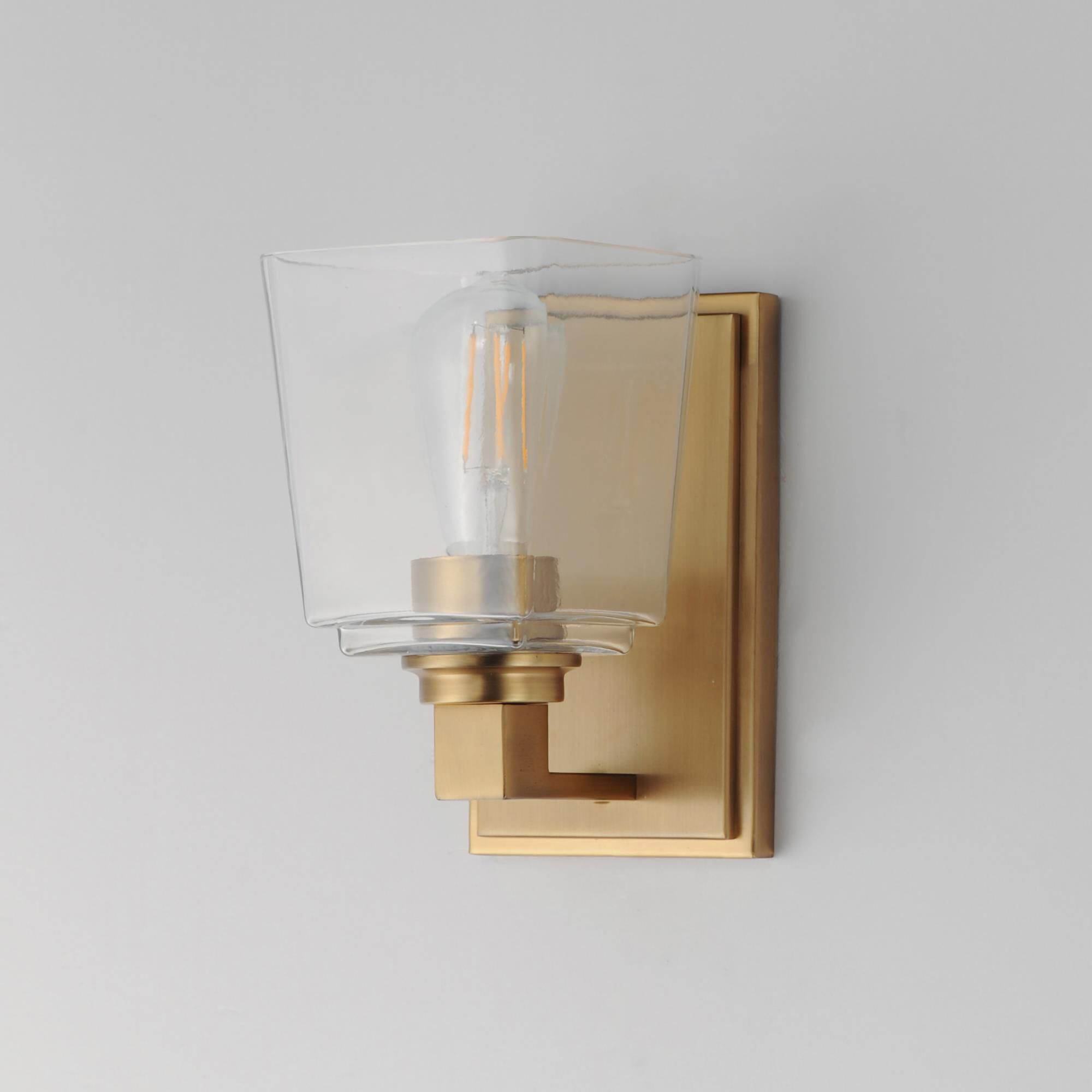 Shown in Natural Aged Brass finish and Clear glass and Glass shade