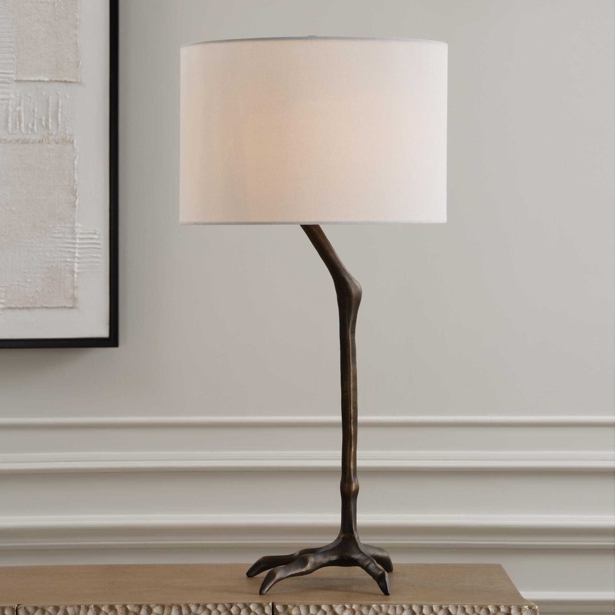 Shown in This Unique Table Lamp Combines Nature-Inspired Elegance With A Touch Of Whimsy, Featuring A Slender finish and Round Drum Hardback shade