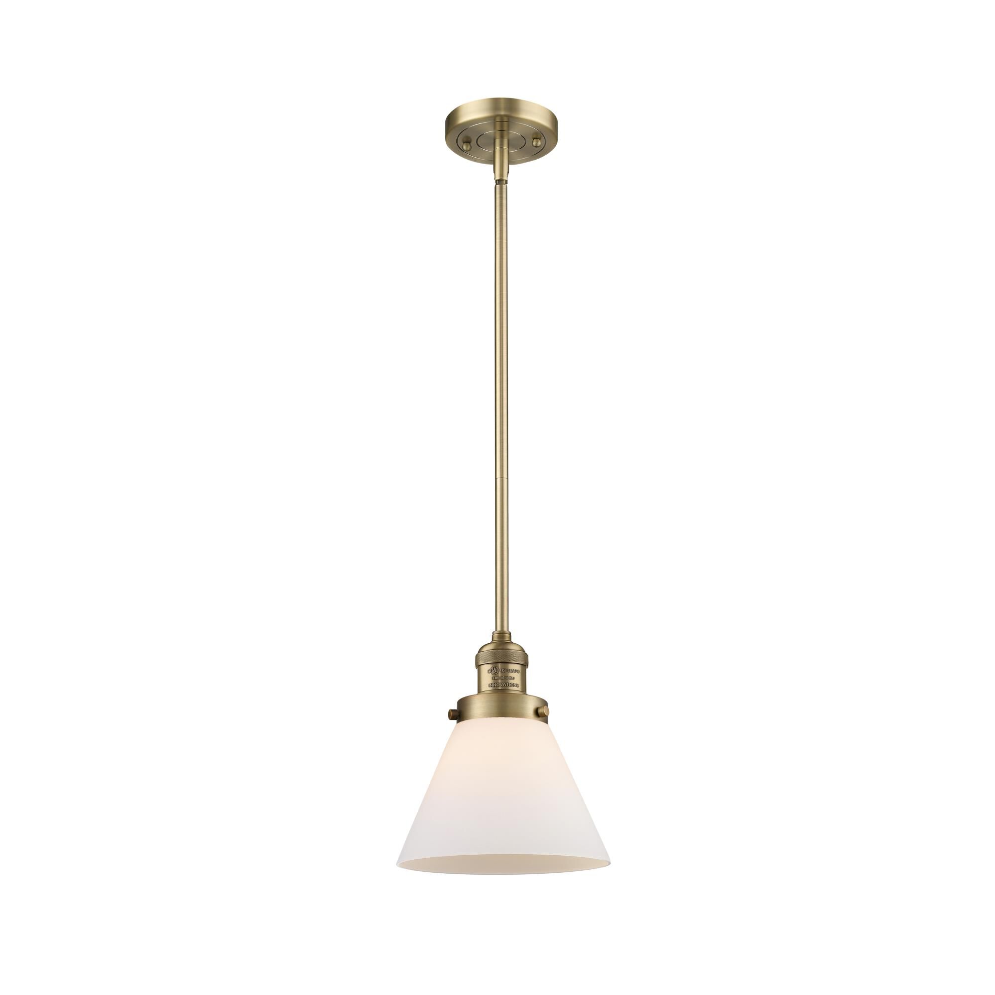 Shown in Brushed Brass finish and Matte White Cased glass