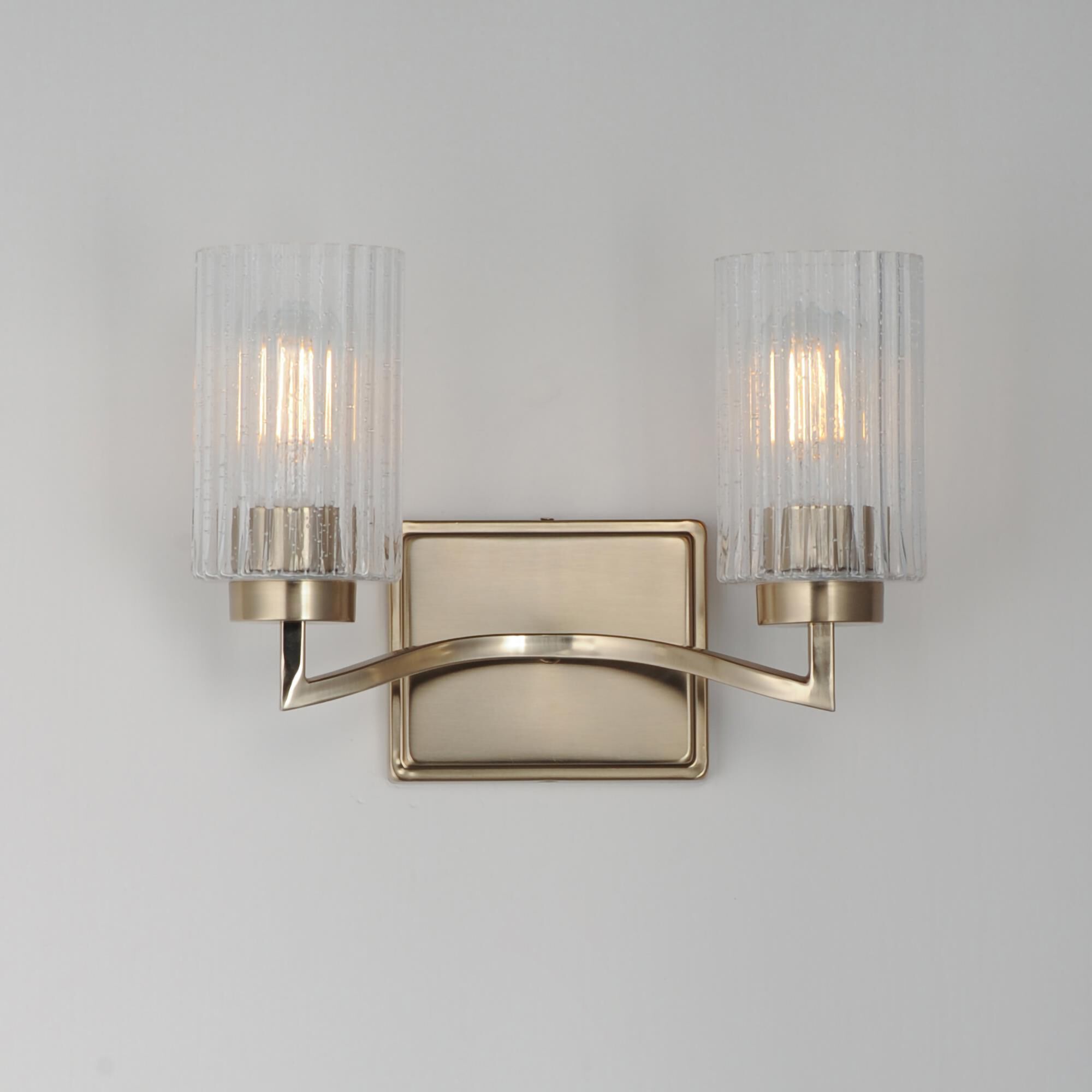 Shown in Satin Champagne finish and Clear Ribbed glass and Glass shade