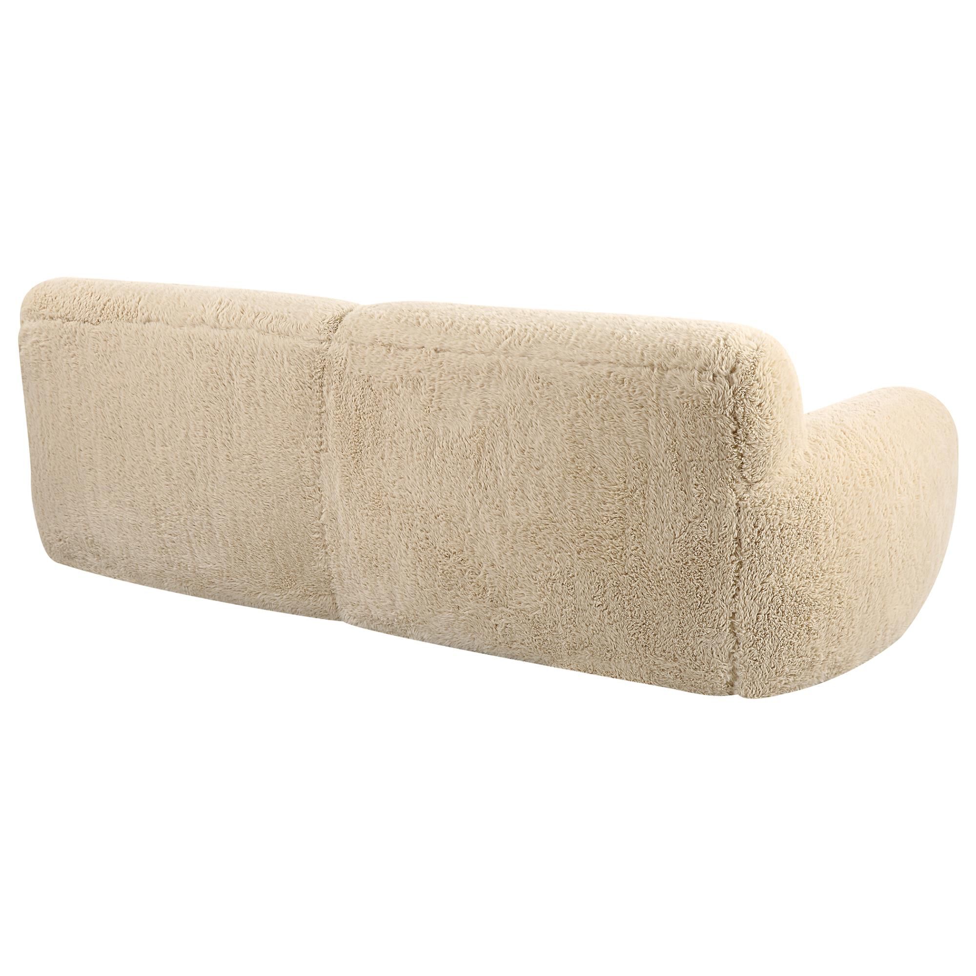 Shown in The Definition Of A Cozy Place To Rest, The Caramel Toned Long-Haired Faux Sheepskin Creates Rich Te finish