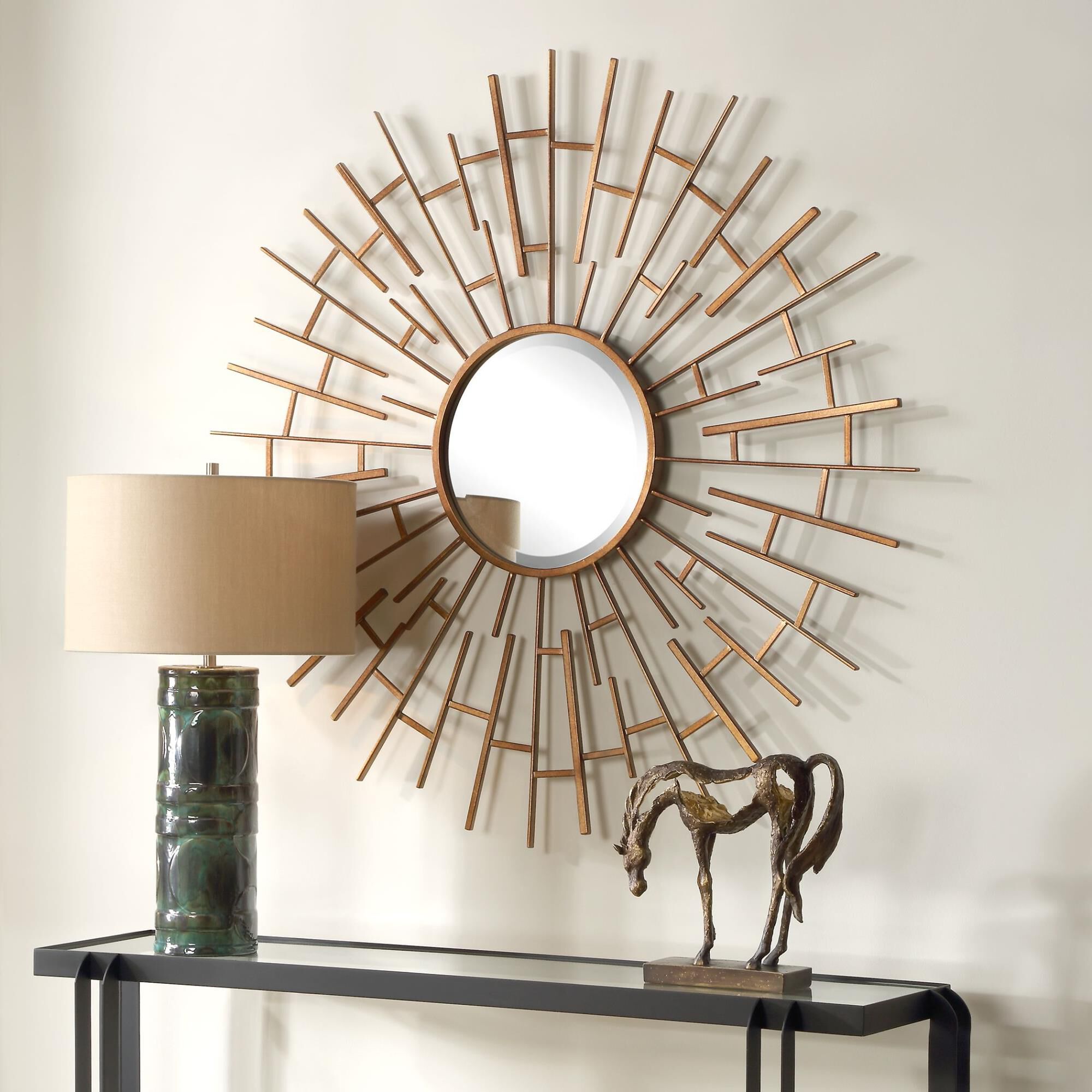 Shown in Framed By A Unique Maze Of Interlocking Iron Rods In Alternating Sizes, The Tangled Round Mirror Is  finish