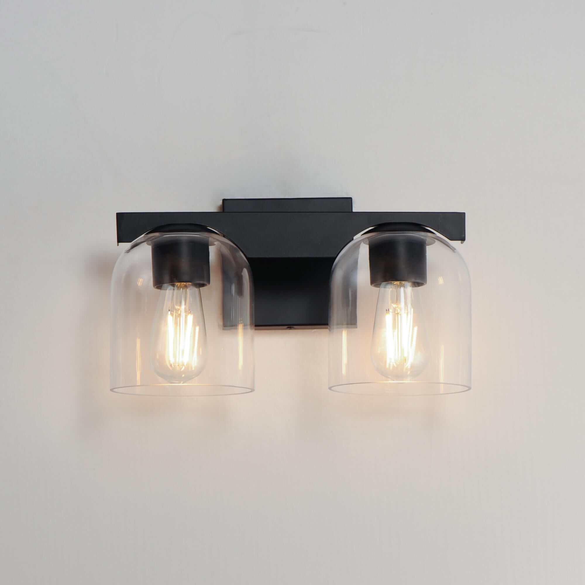 Shown in Black finish and Clear glass and Glass shade