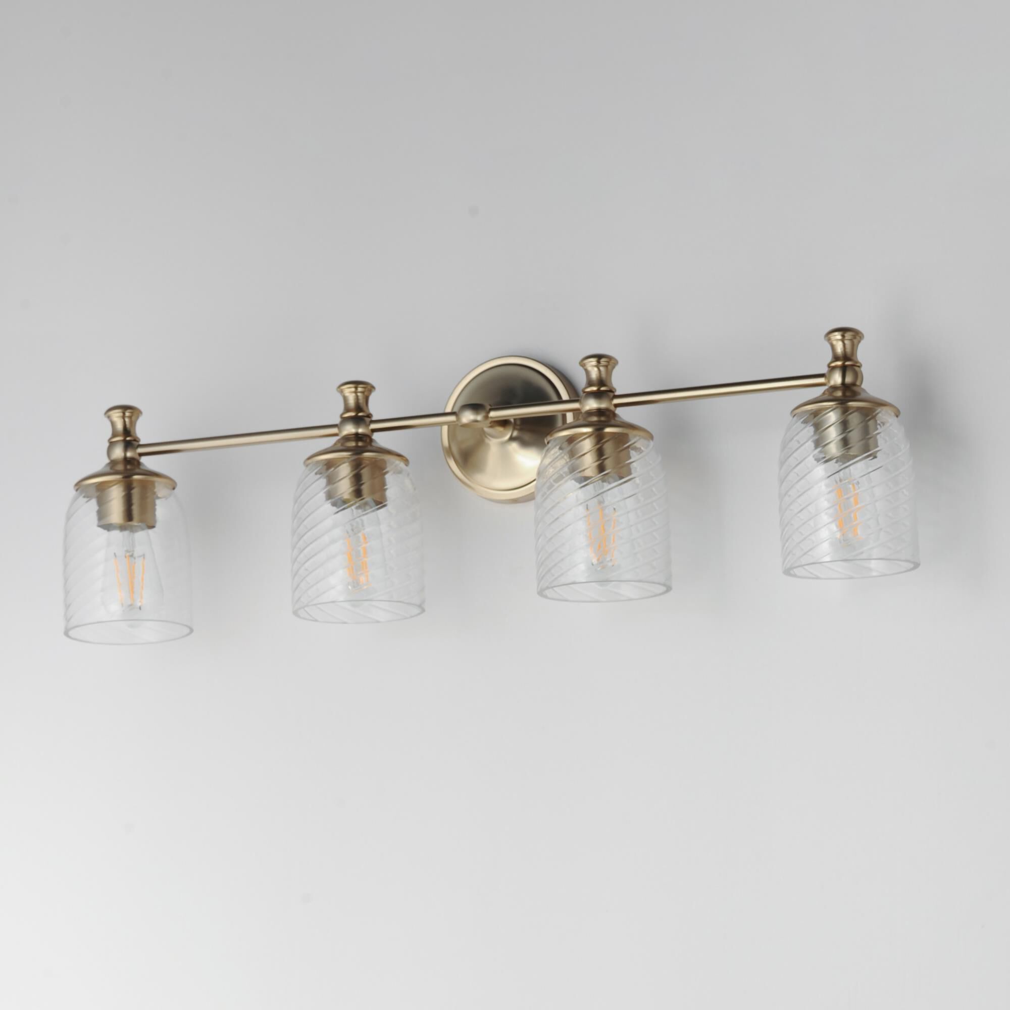 Shown in Satin Champagne finish and Clear Ribbed glass and Glass shade