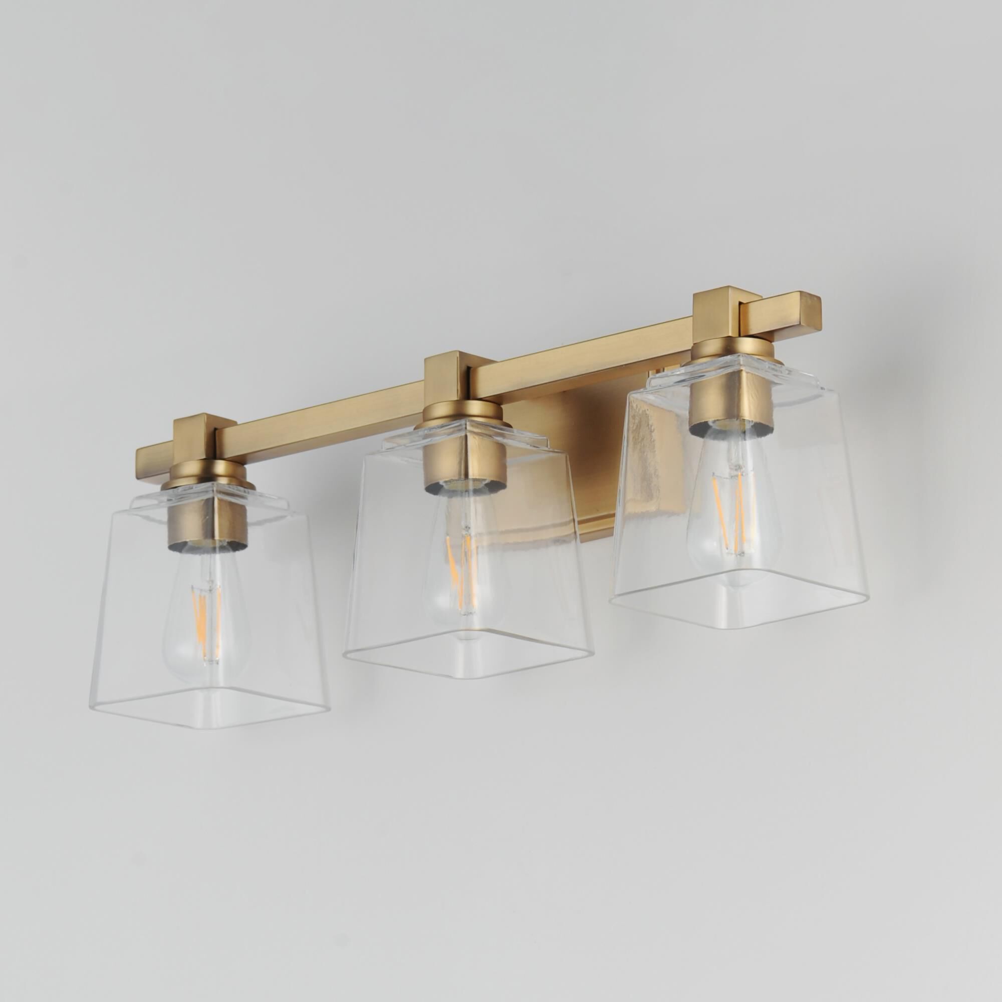 Shown in Natural Aged Brass finish and Clear glass and Glass shade