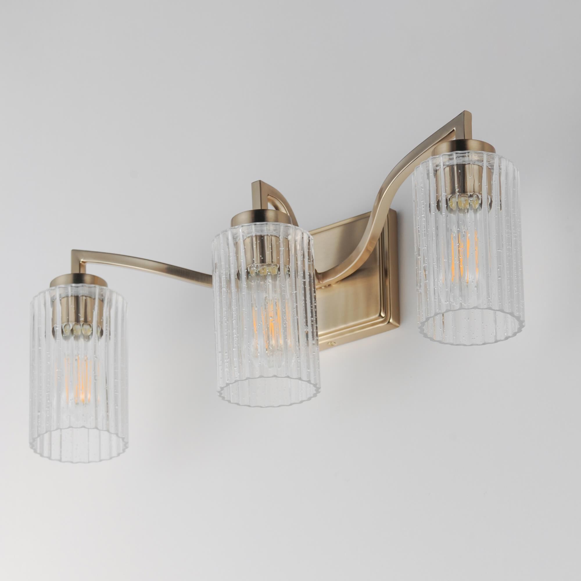 Shown in Satin Champagne finish and Clear Ribbed glass and Glass shade