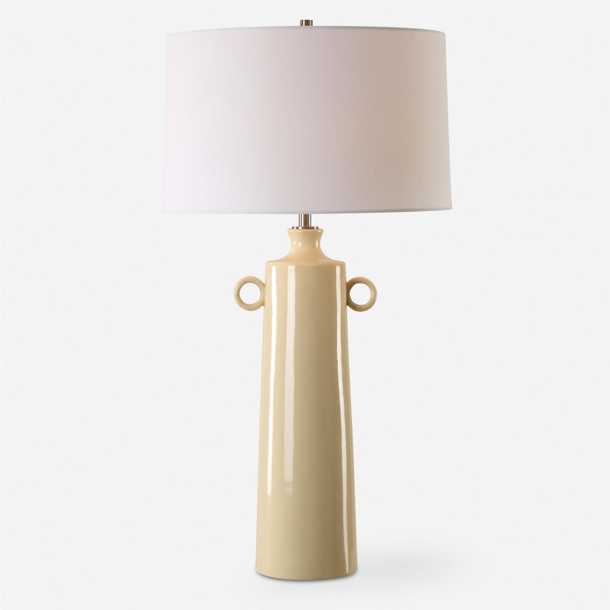 Shown in This Ceramic Lamp Boasts A Vase-Like Shaped Base In A Pale Yellow Crackled Glaze, Accented With Plat finish and Taper Drum Hardback shade