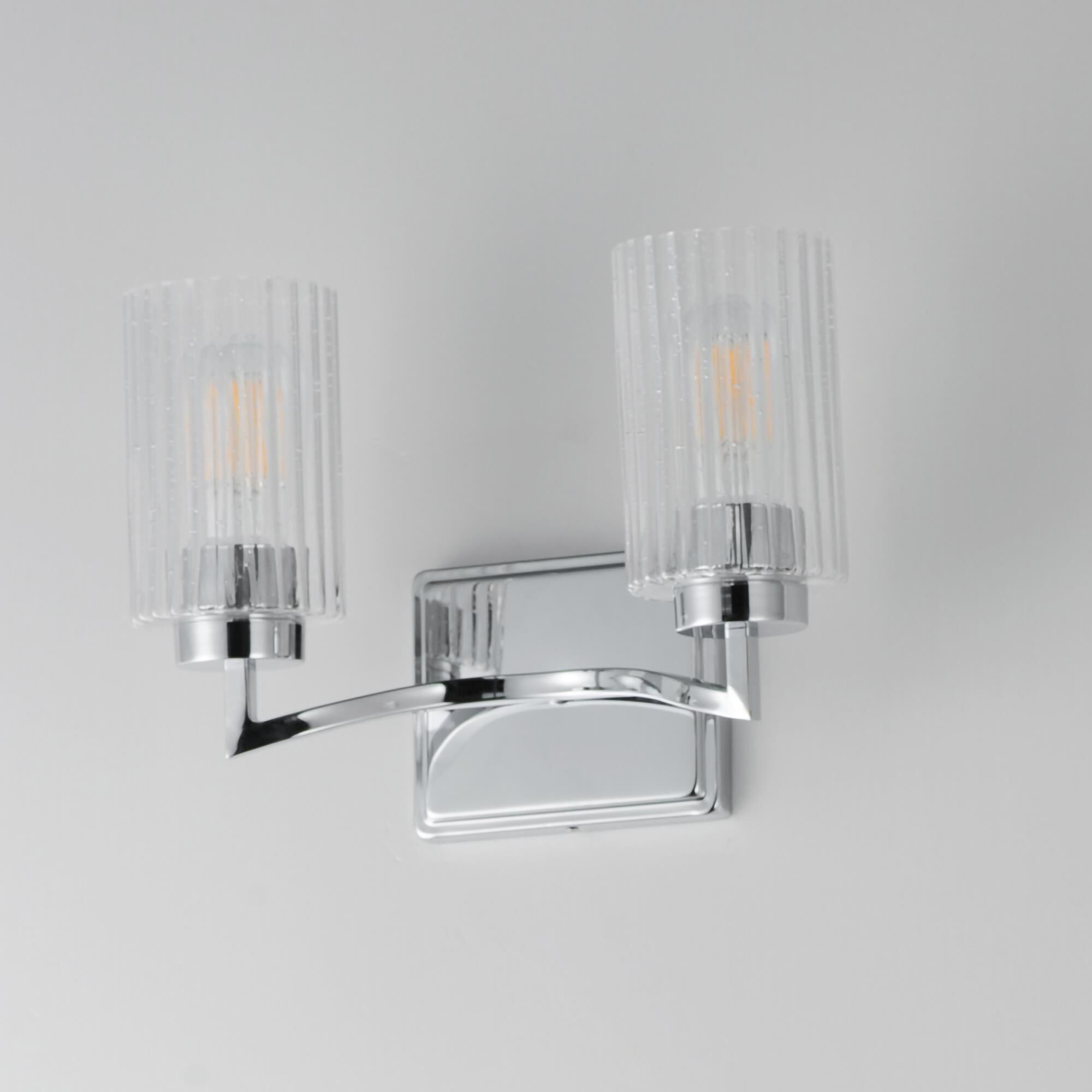 Shown in Polished Nickel finish and Clear Ribbed glass and Glass shade