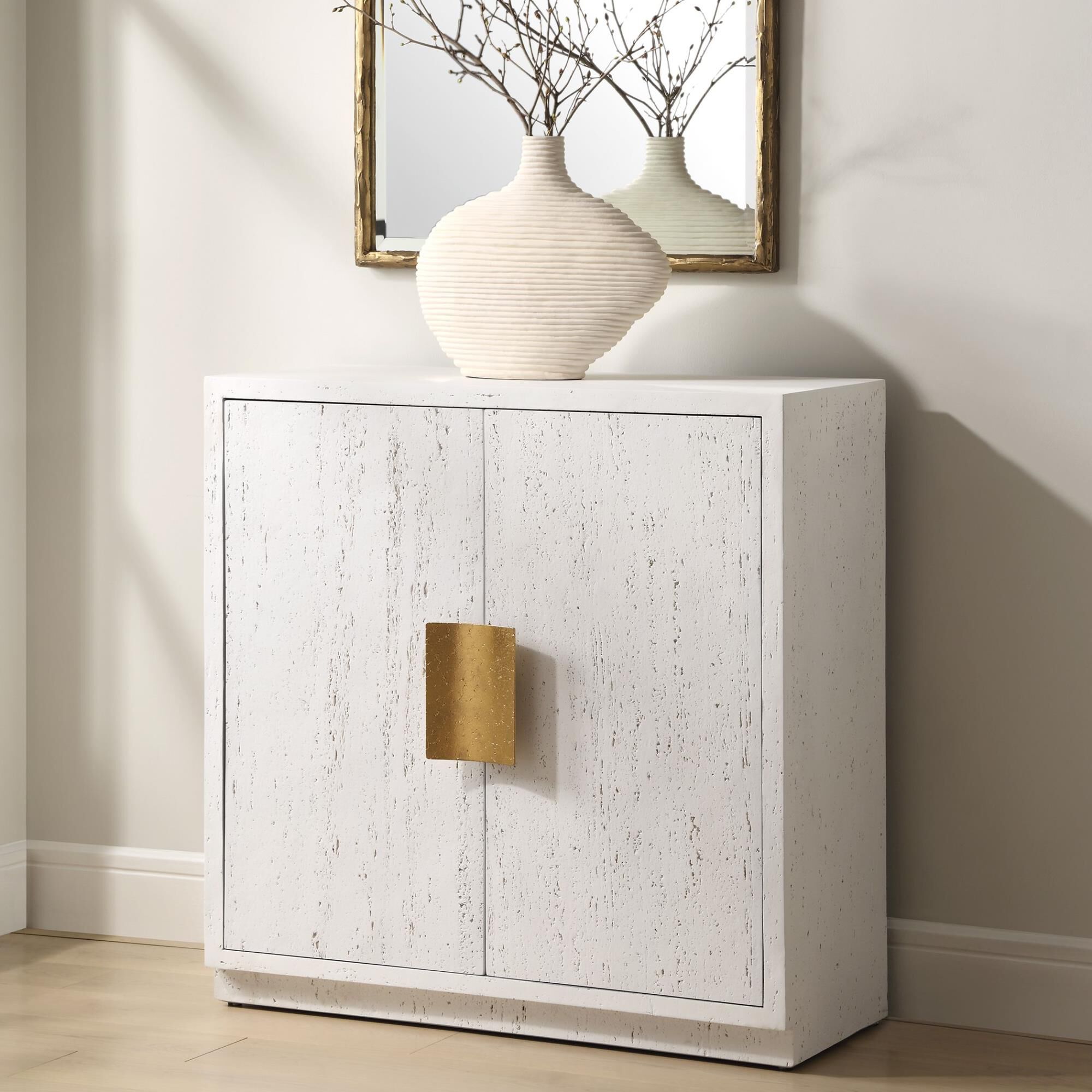 Shown in A Stylish Two Door Cabinet Crafted From Cast Resin. Emma Features A Porous Textured Surface For An O finish