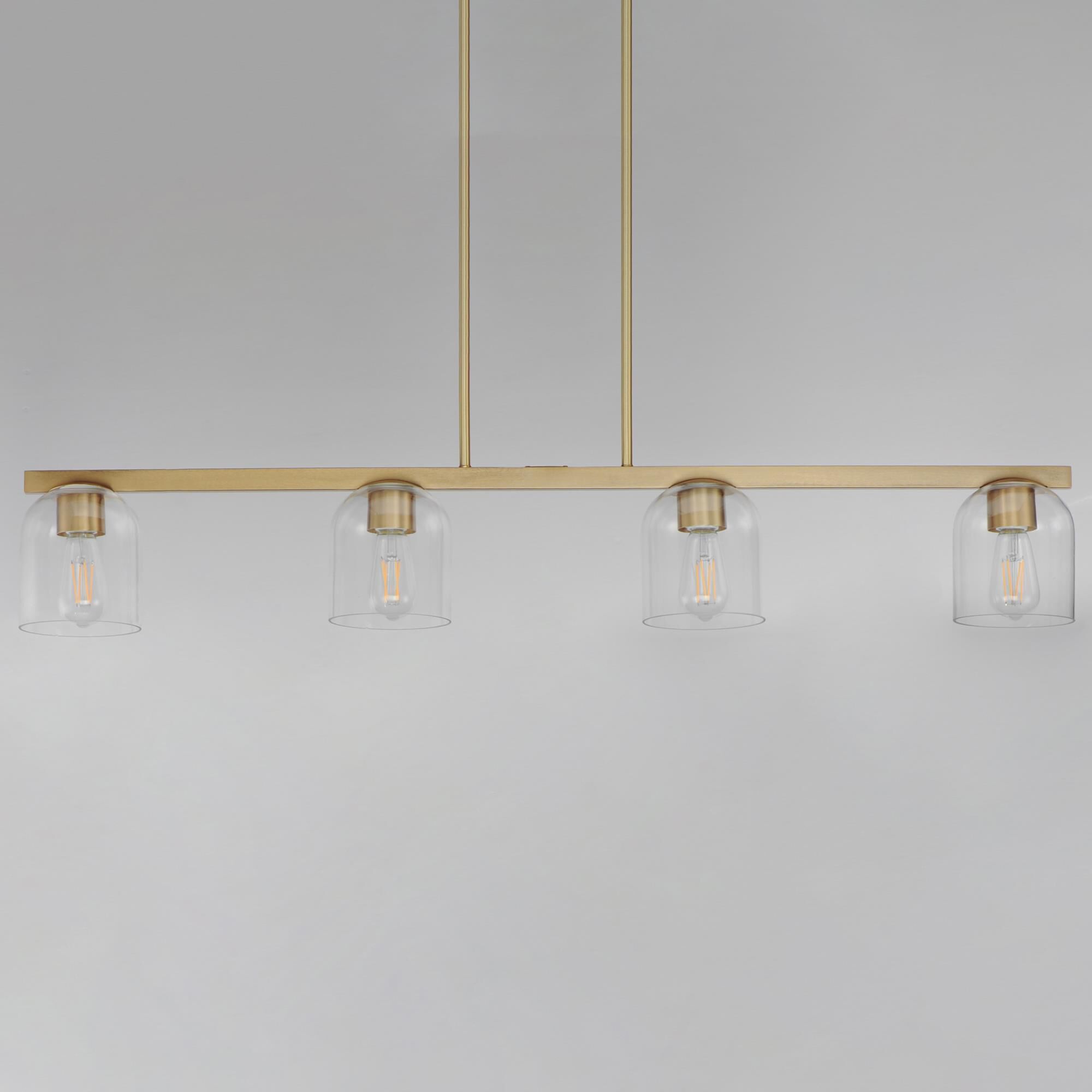 Shown in Natural Aged Brass finish and Clear glass and Glass shade