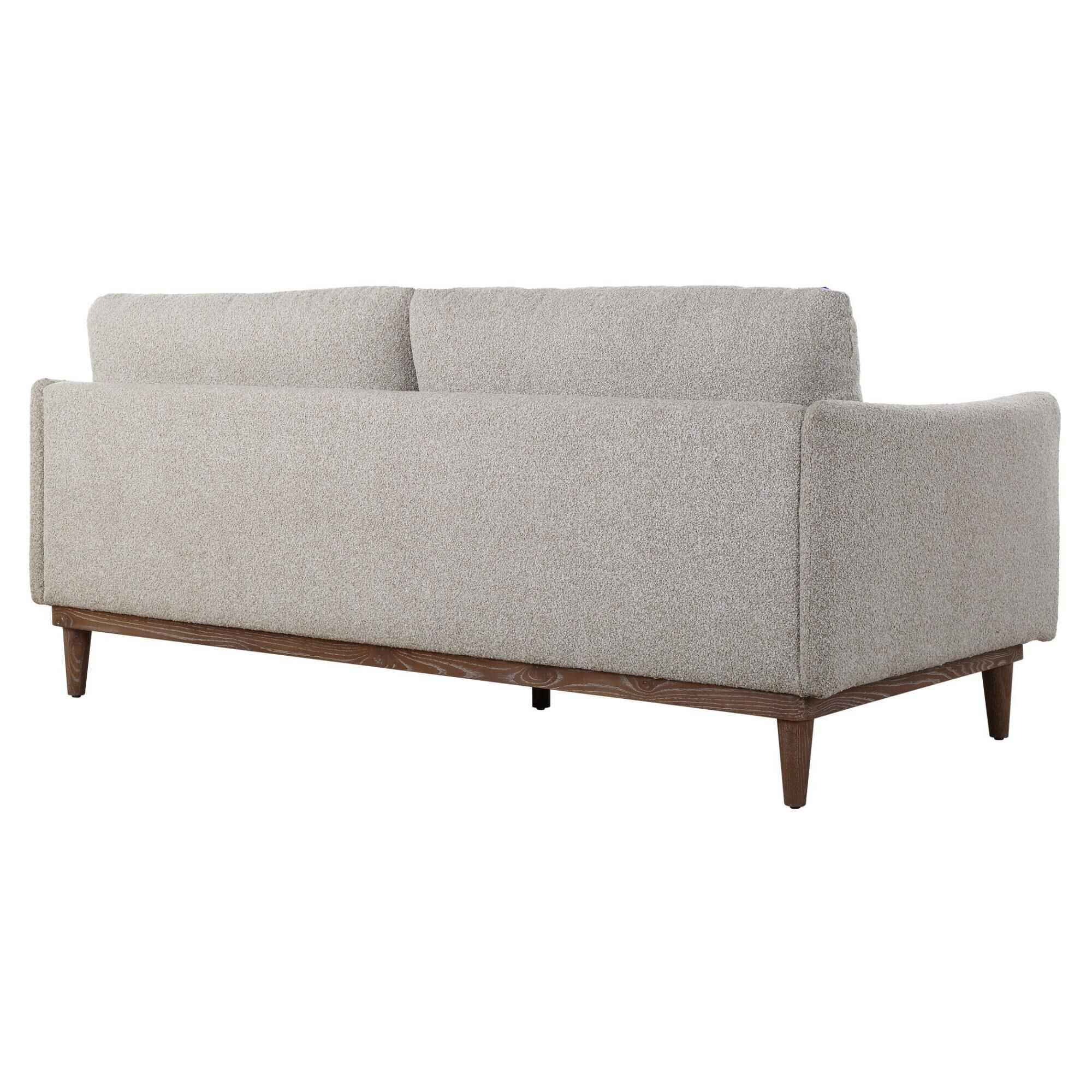 Shown in Relax In The Sink-In Comfort Of The Freefall Sofa. Featuring Clean Modern Lines And Resting On A Sol finish