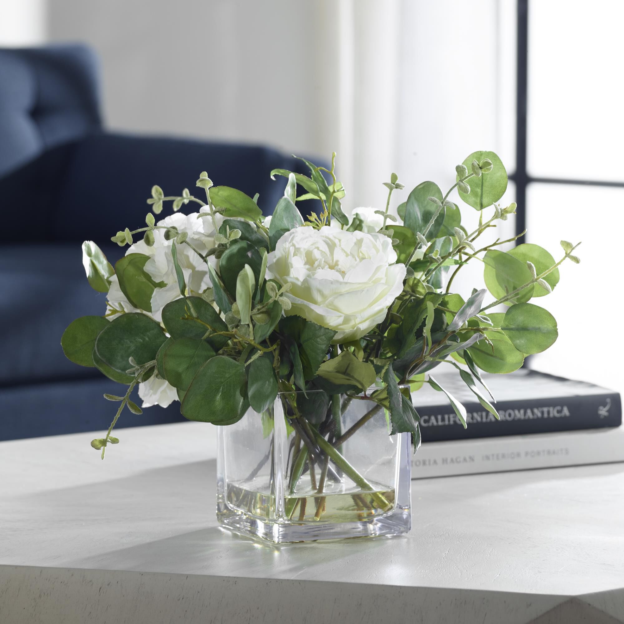 Shown in An Airy Mix As If Freshly Cut From The Garden, Featuring Cream Hydrangeas, Roses, Eucalyptus Placed  finish