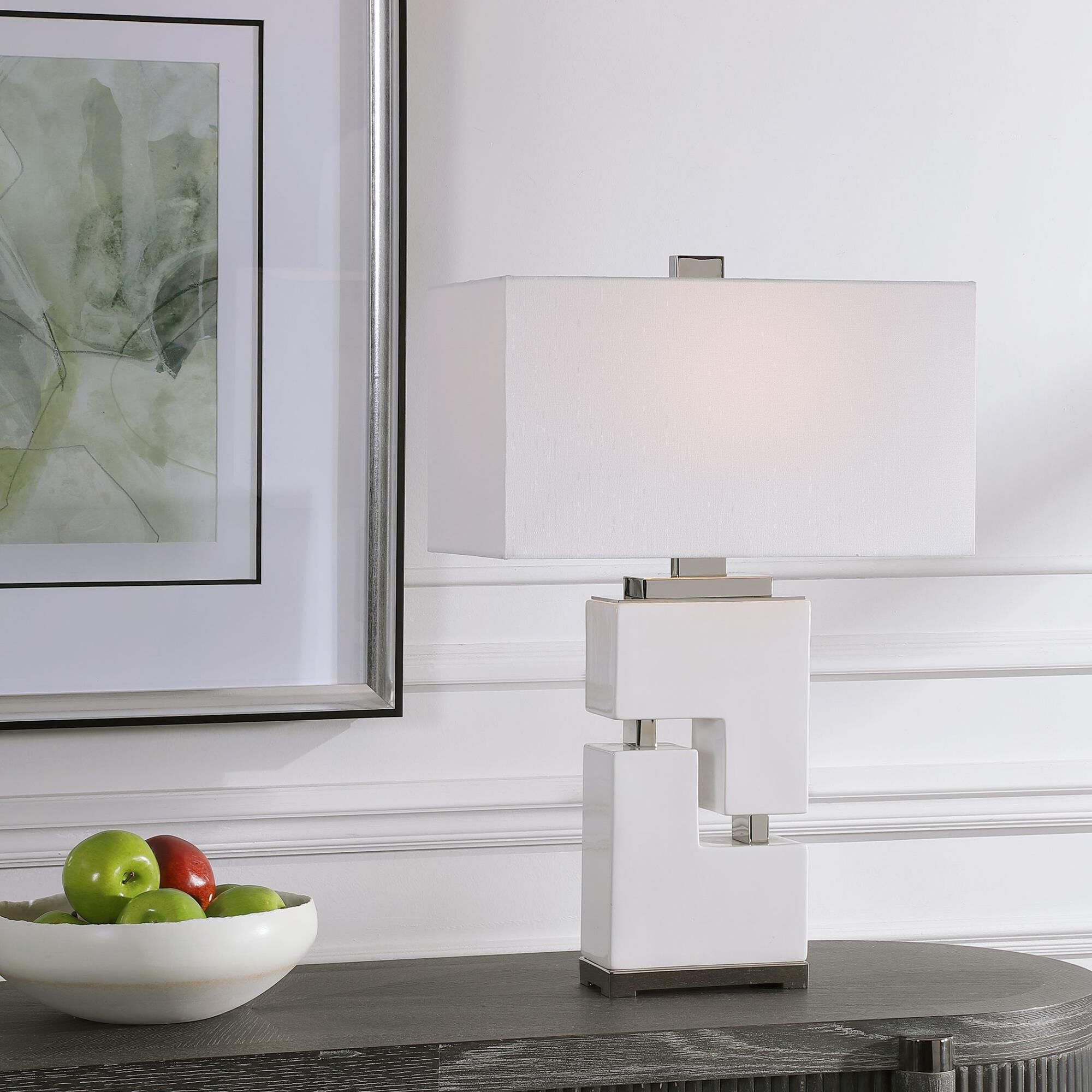 Shown in Exhibiting A Clean And Contemporary Look, This Ceramic Table Lamp Features Stacked Geometric Shapes  finish and Retangle shade