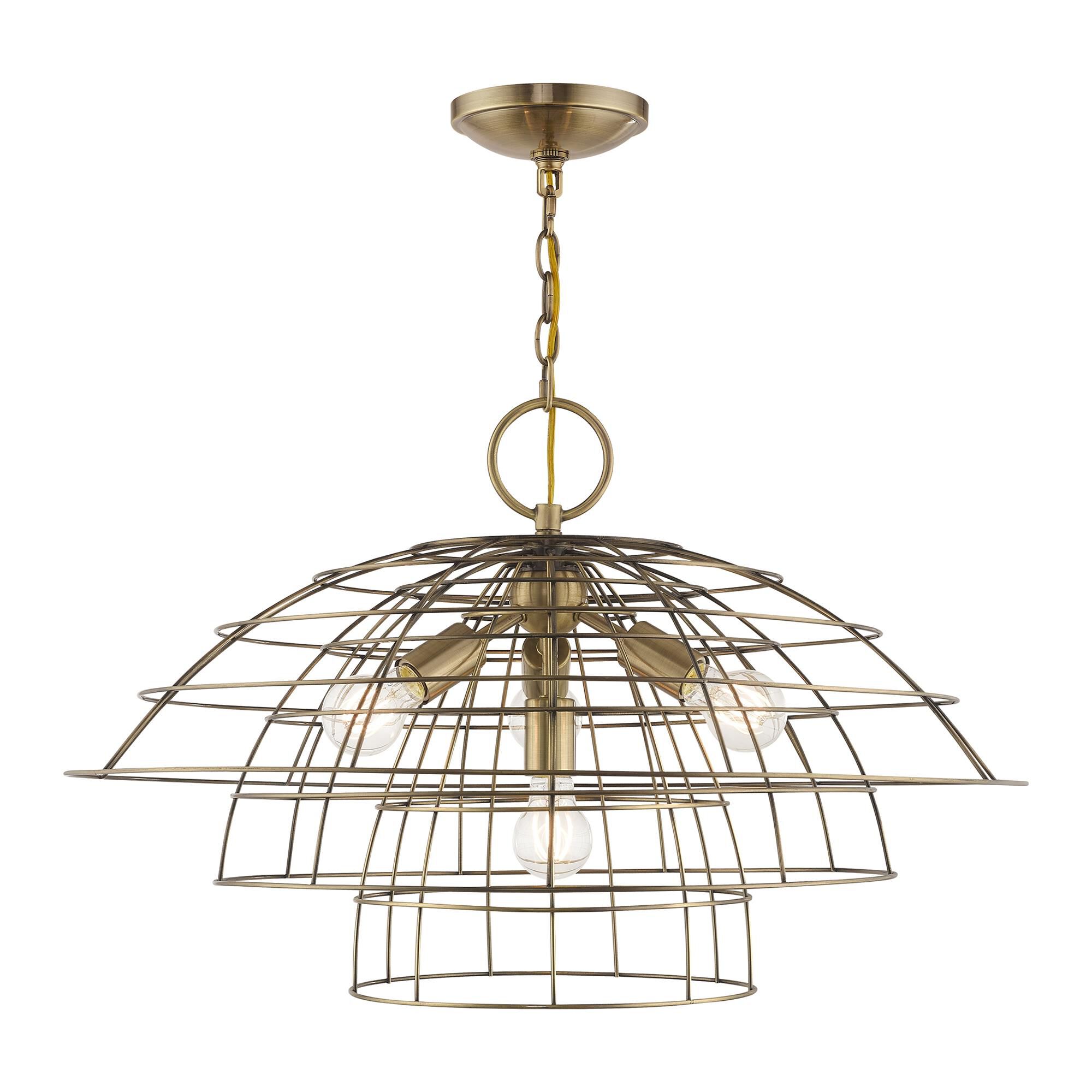 Shown in Antique Brass finish and Antique Brass Hand Crafted Steel Wire Cage shade