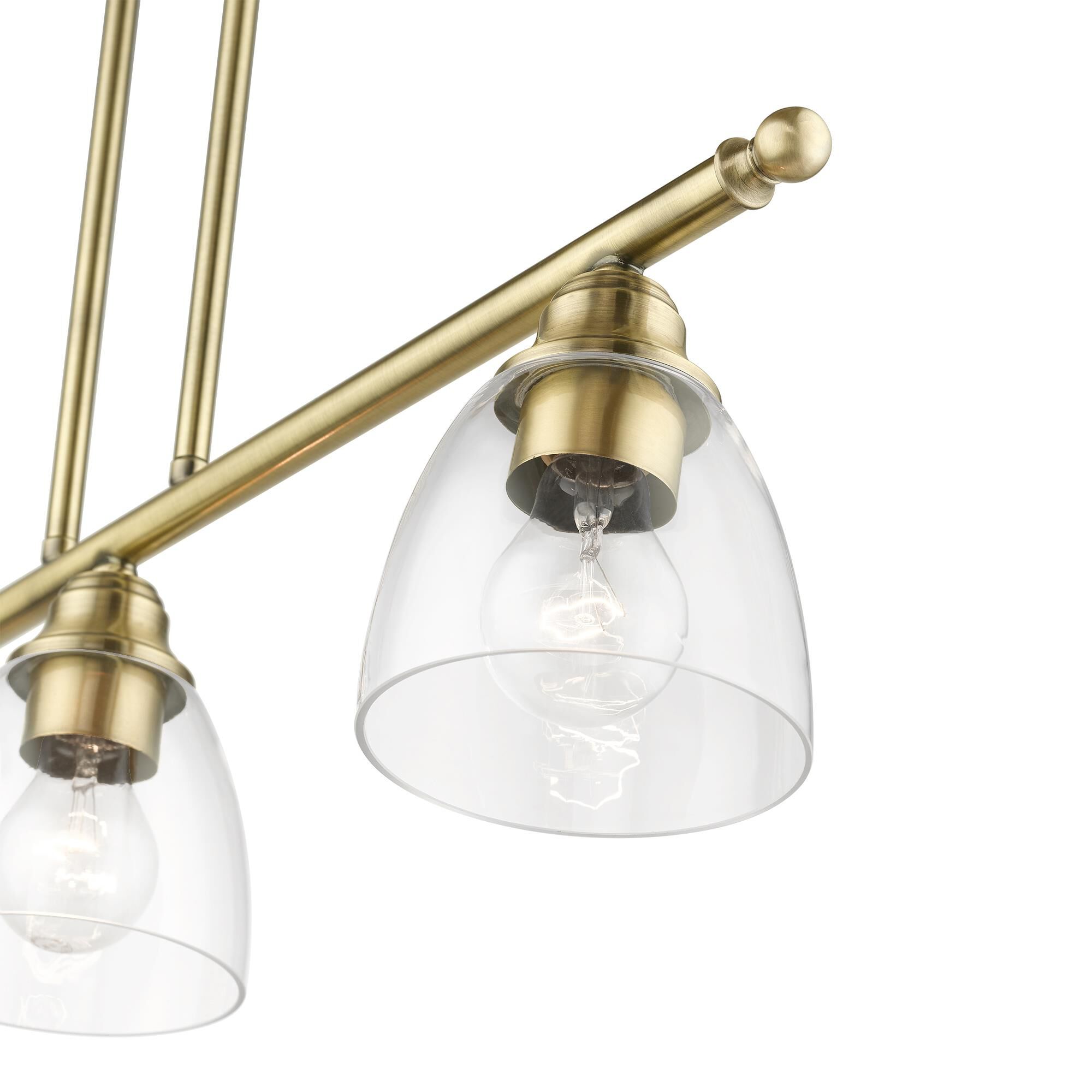 Shown in Antique Brass finish and Hand Blown Clear glass