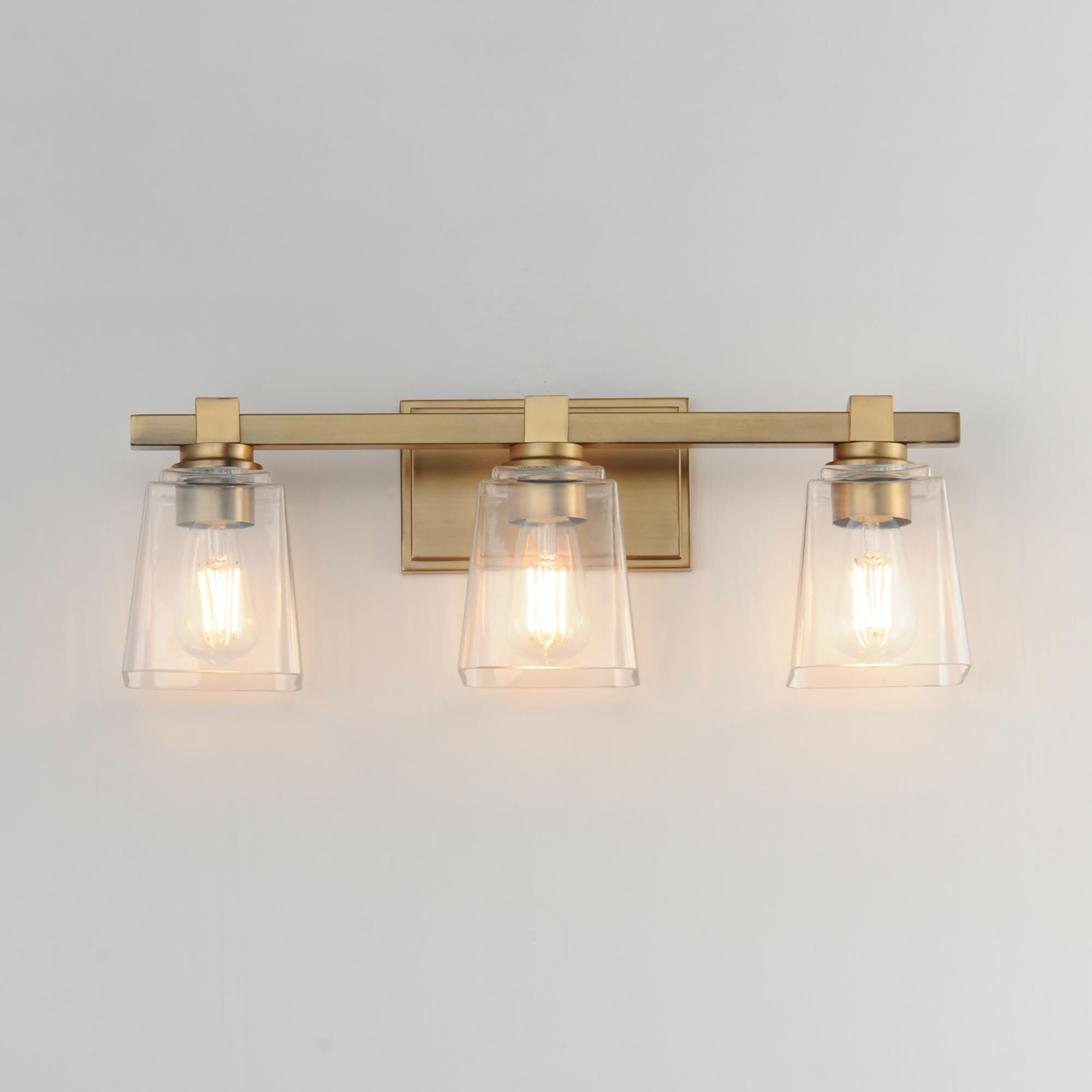 Shown in Natural Aged Brass finish and Clear glass and Glass shade