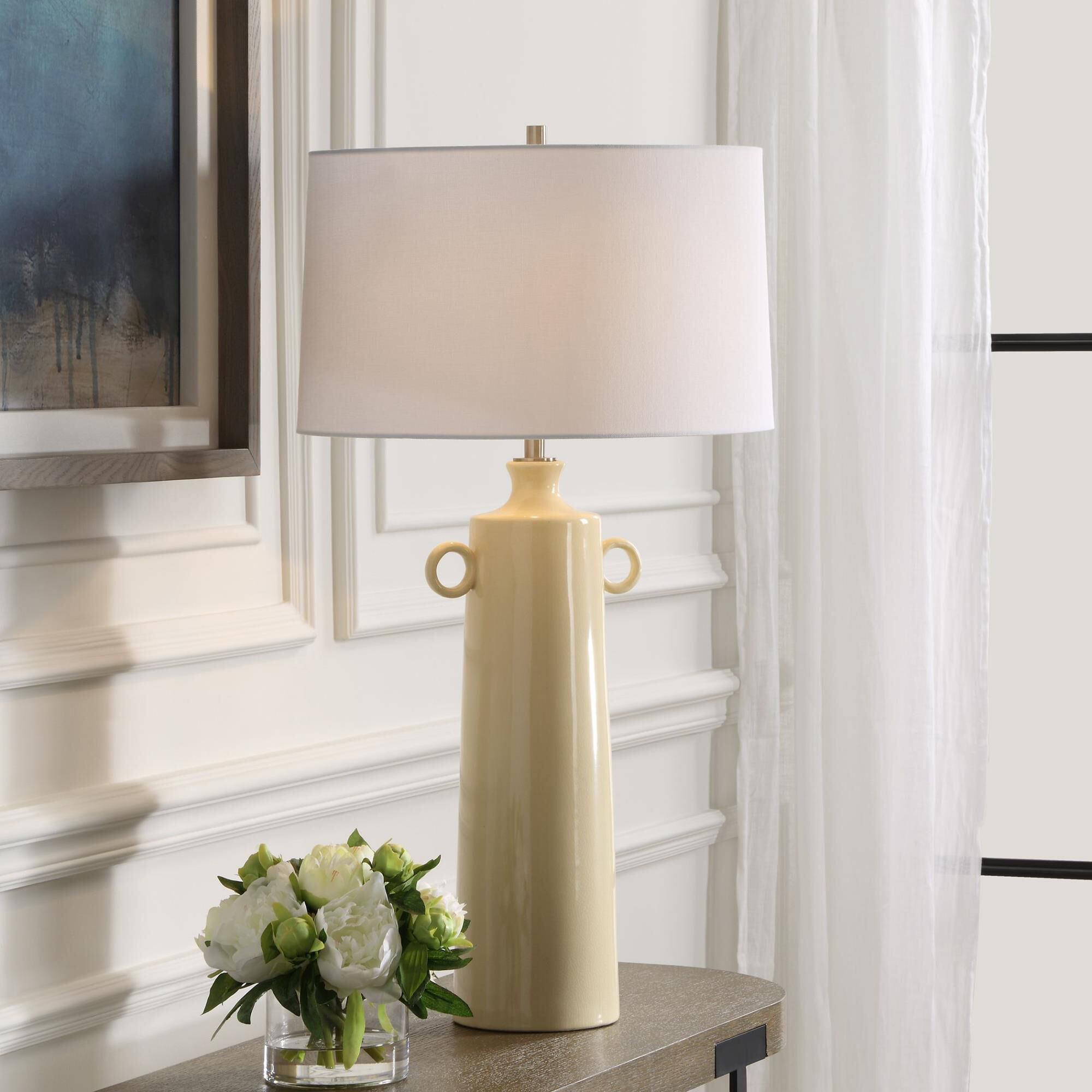 Shown in This Ceramic Lamp Boasts A Vase-Like Shaped Base In A Pale Yellow Crackled Glaze, Accented With Plat finish and Taper Drum Hardback shade