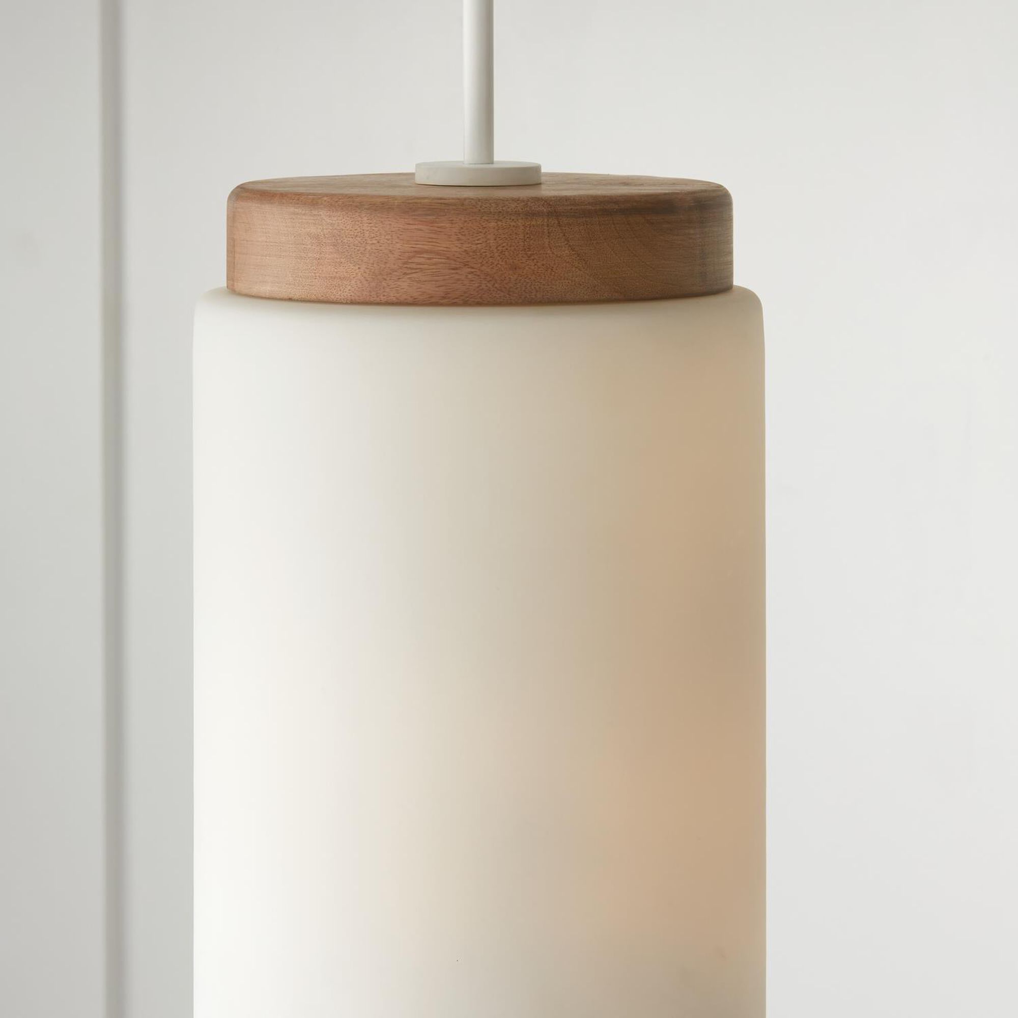 Shown in Light Wood And White finish and Soft White glass