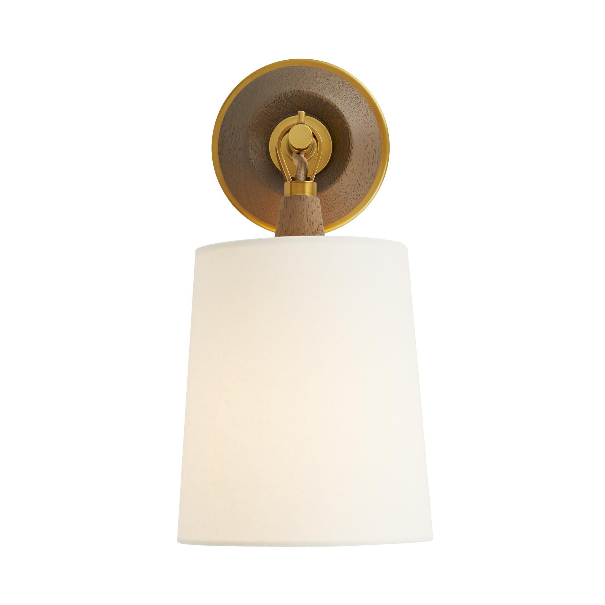 Shown in Antique Brass finish and Linen shade