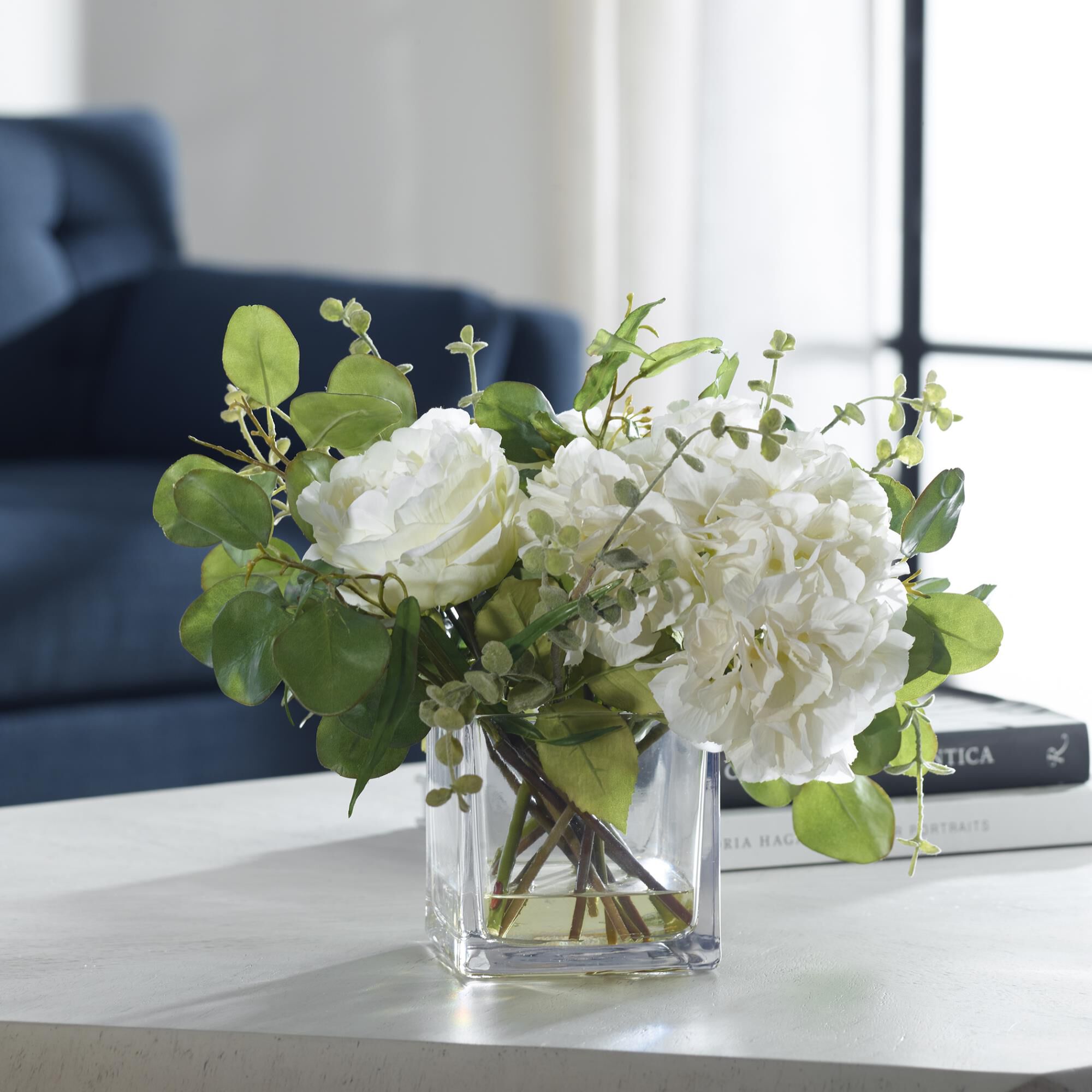 Shown in An Airy Mix As If Freshly Cut From The Garden, Featuring Cream Hydrangeas, Roses, Eucalyptus Placed  finish