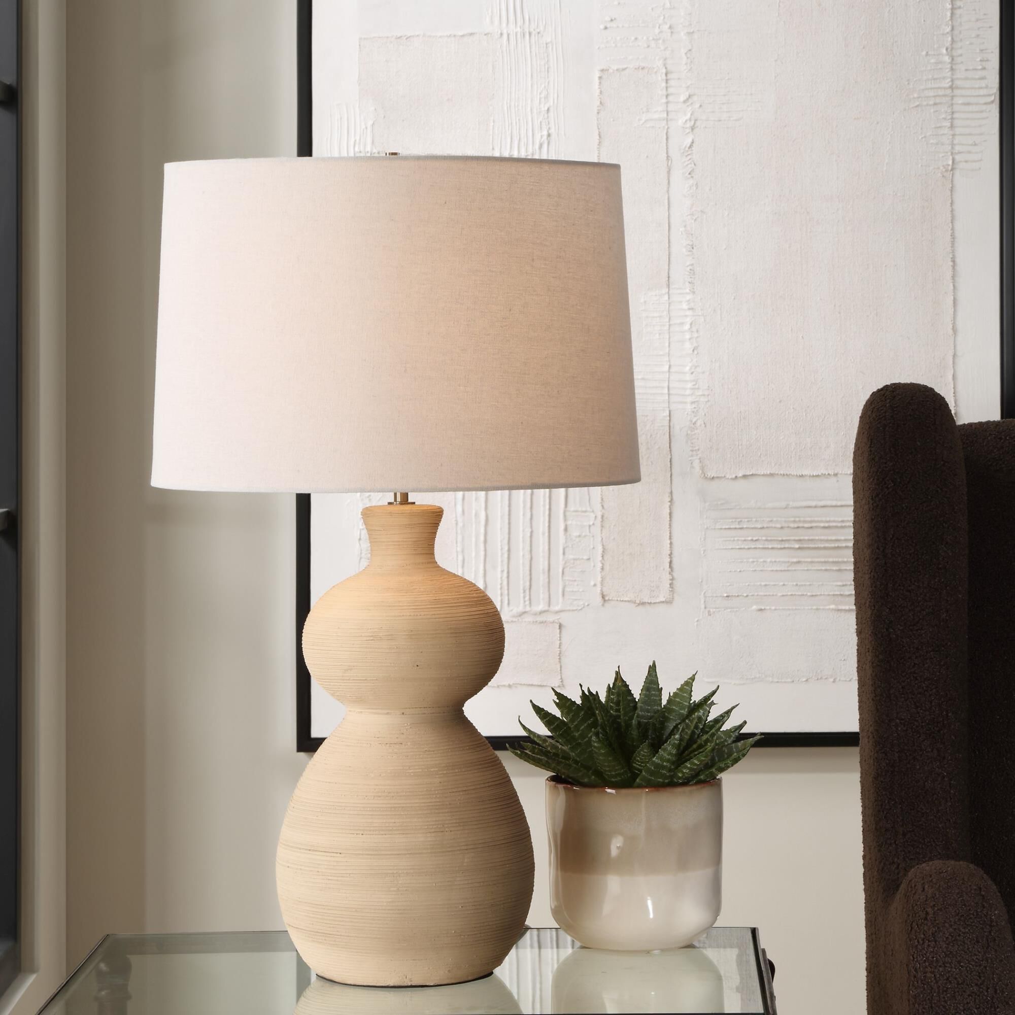 Shown in The Pueblo Table Lamp Combines The Rustic Beauty Of The Southwest With A Touch Of Timeless Elegance  finish and Round Hardback shade