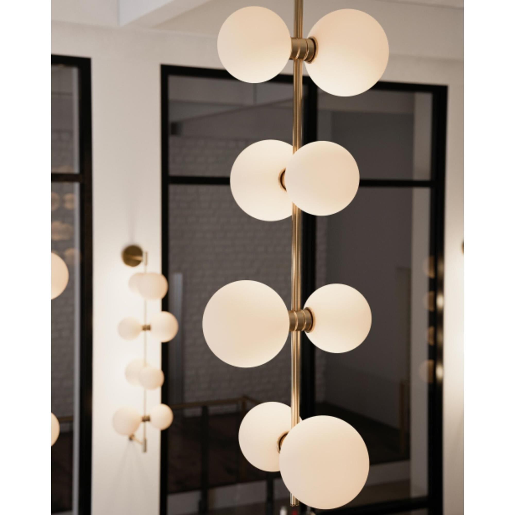 Shown in Aged Brass finish and Frosted Globes Or Cylinders shade