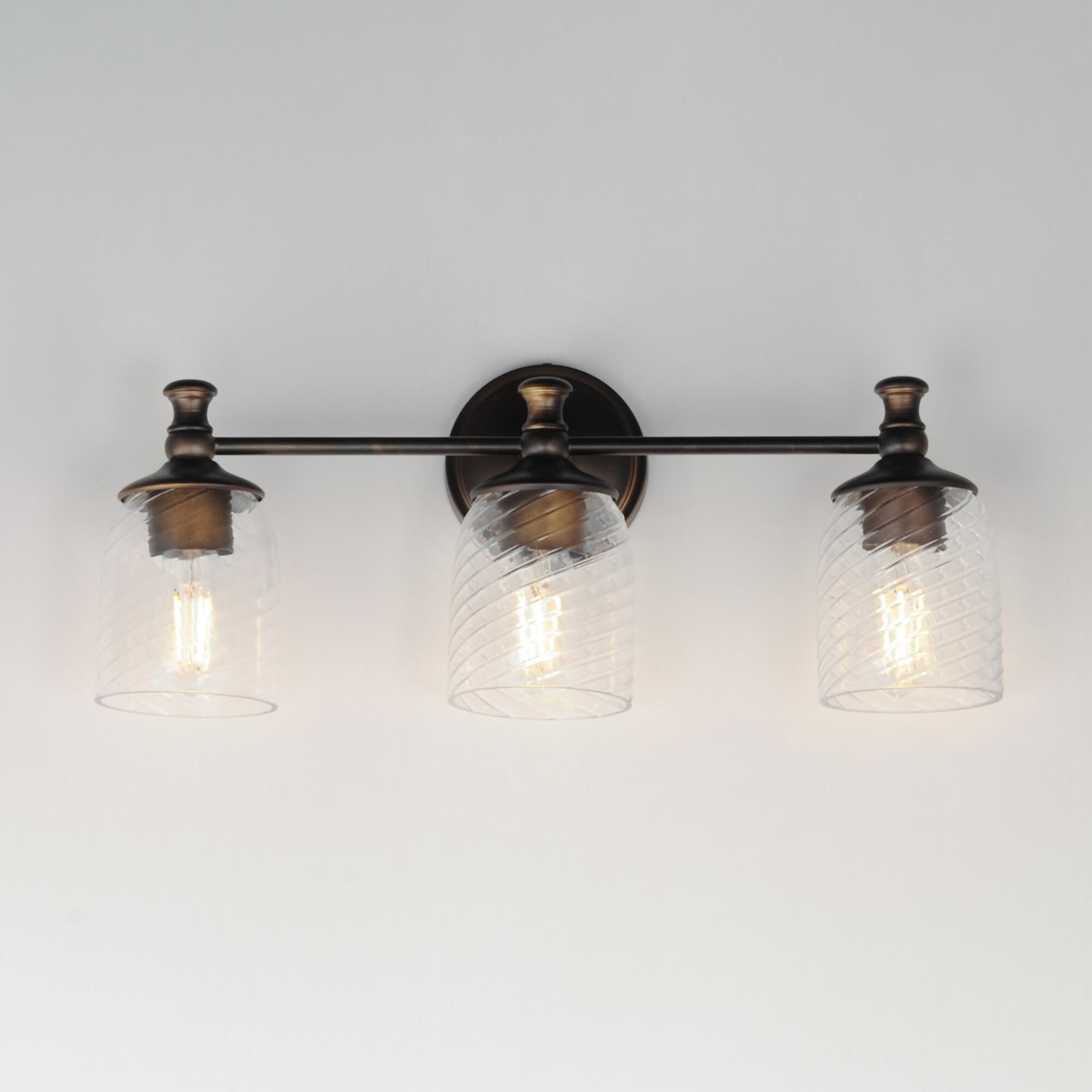 Shown in Antique Bronze finish and Clear Ribbed glass and Glass shade