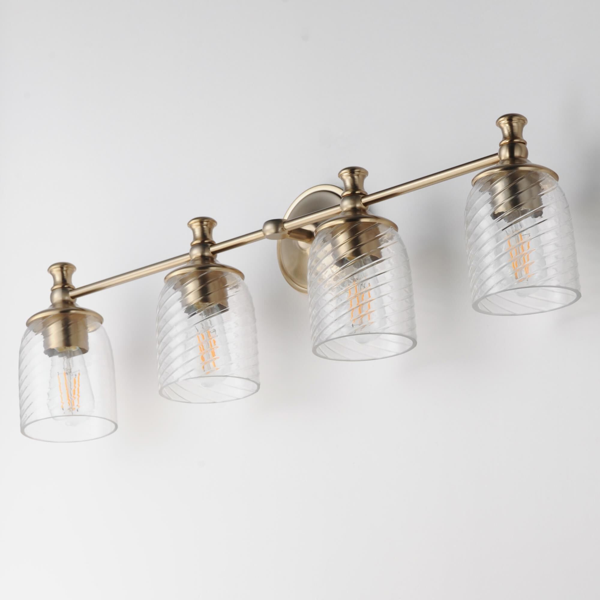 Shown in Satin Champagne finish and Clear Ribbed glass and Glass shade