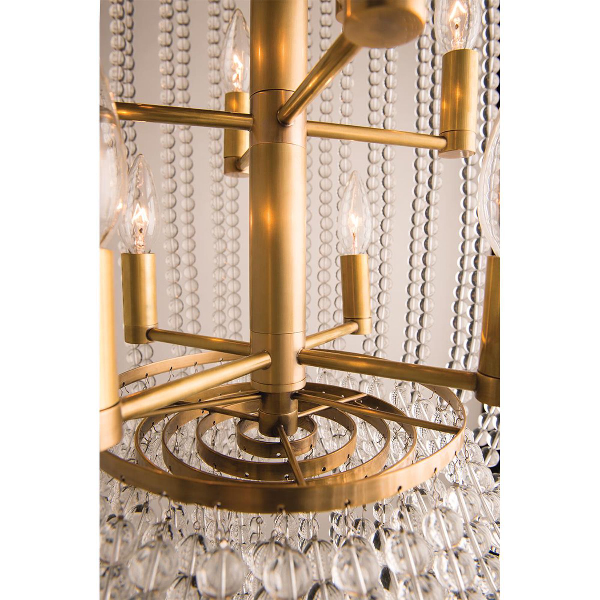 Shown in Aged Brass finish and Clear Crystal glass