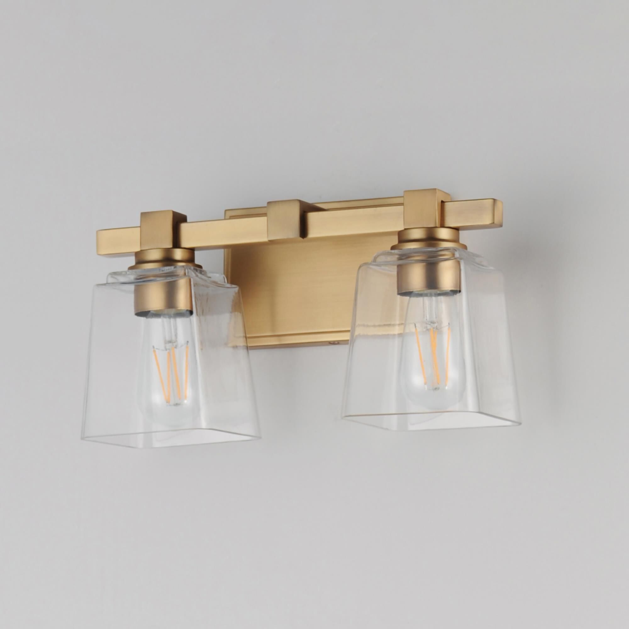 Shown in Natural Aged Brass finish and Clear glass and Glass shade