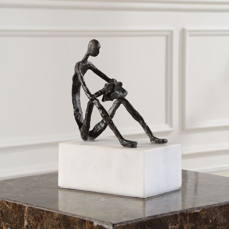 Osvaldo Mendoza Sit Back, Relax And Read Figurine by Uttermost