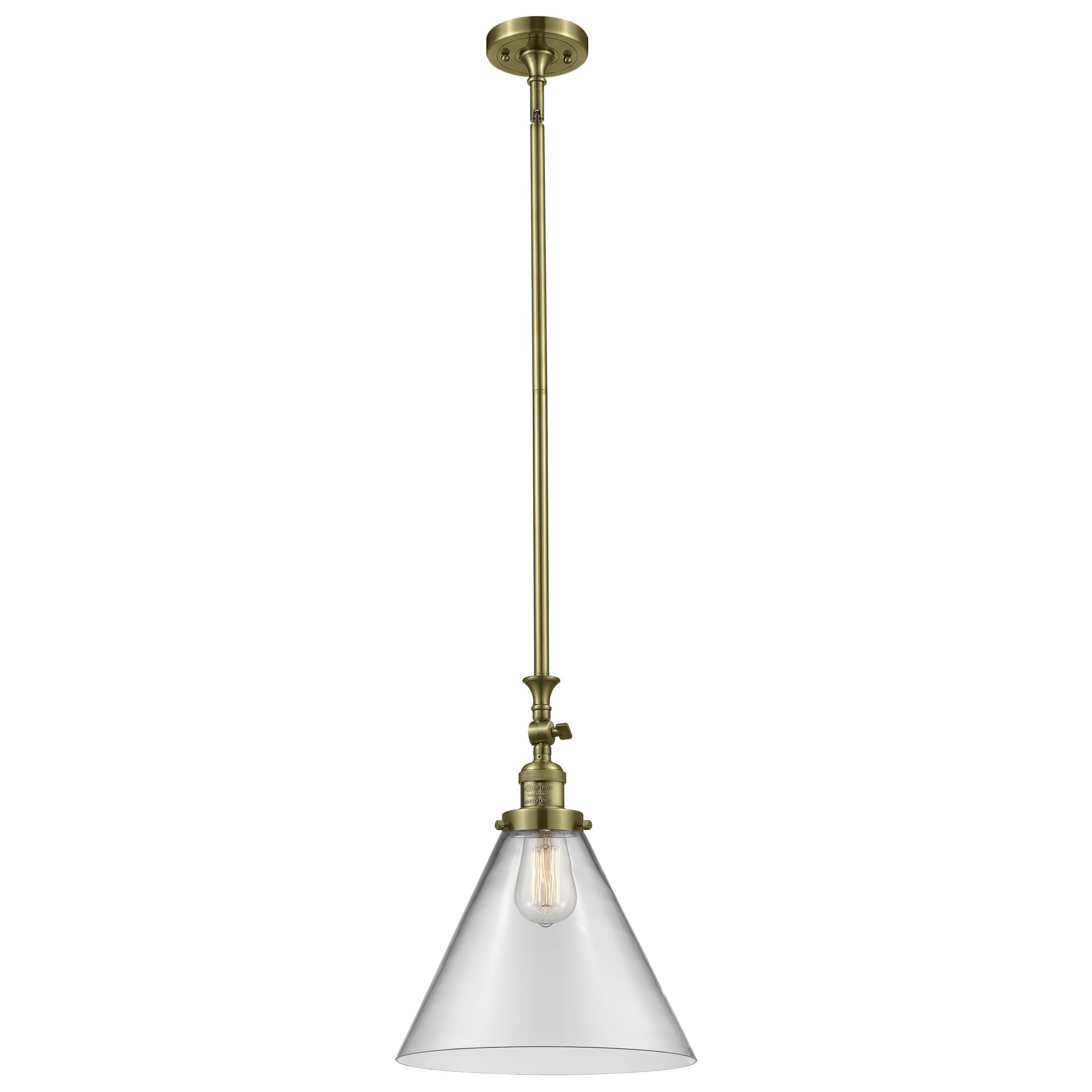 Shown in Antique Brass finish and Clear glass