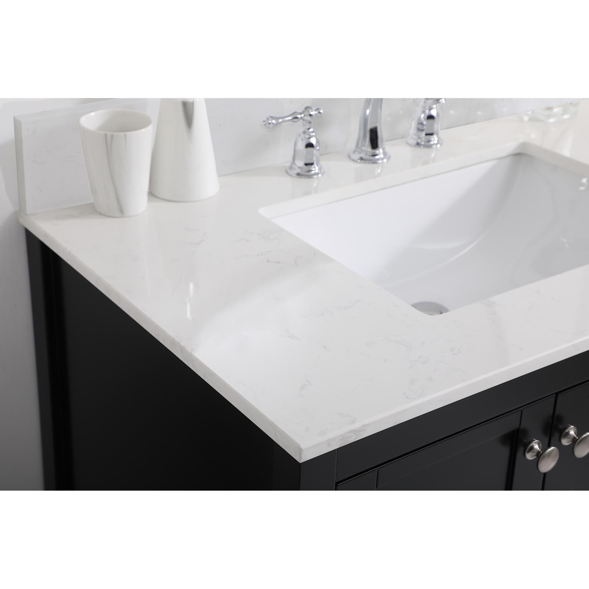 Shown in Black And Brushed Nickel With Calacatta Quartz finish